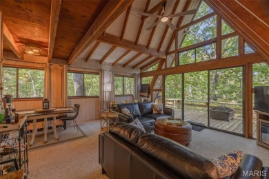 This cozy chalet offers the classic A-frame design with a on Innsbrook Resort Golf Course in Missouri - for sale on GolfHomes.com, golf home, golf lot