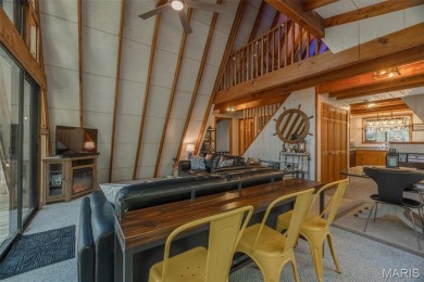 This cozy chalet offers the classic A-frame design with a on Innsbrook Resort Golf Course in Missouri - for sale on GolfHomes.com, golf home, golf lot