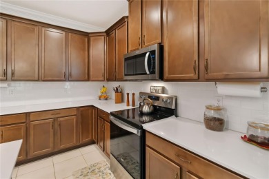 Welcome to this stunning 3-bedroom, 3-bathroom home with an on Harmony Golf Preserve in Florida - for sale on GolfHomes.com, golf home, golf lot
