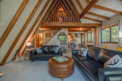 This cozy chalet offers the classic A-frame design with a on Innsbrook Resort Golf Course in Missouri - for sale on GolfHomes.com, golf home, golf lot