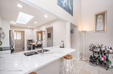 Nestled in the heart of Suntree you'll find this charming on Suntree Country Club in Florida - for sale on GolfHomes.com, golf home, golf lot