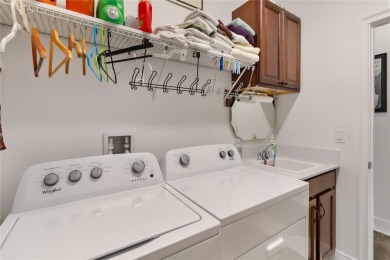 Welcome to this stunning 3-bedroom, 3-bathroom home with an on Harmony Golf Preserve in Florida - for sale on GolfHomes.com, golf home, golf lot