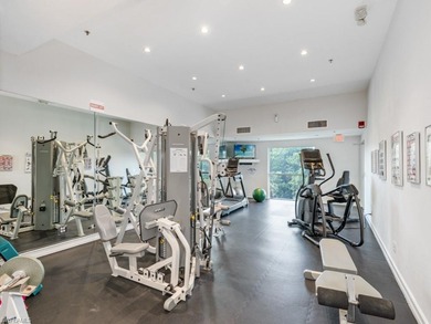 Rising high above Estero Bay, this 7th floor sky home at Bayview on Bonita Bay West in Florida - for sale on GolfHomes.com, golf home, golf lot