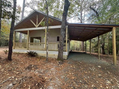 NEW CONSTRUCTION!! Darling cabin in the woods! Located in a on Rayburn Country Club in Texas - for sale on GolfHomes.com, golf home, golf lot