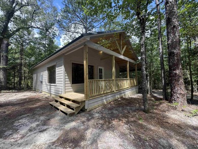 NEW CONSTRUCTION!! Darling cabin in the woods! Located in a on Rayburn Country Club in Texas - for sale on GolfHomes.com, golf home, golf lot
