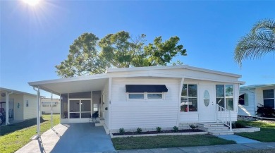 This beautifully updated two-bedroom, two-bath home offers the on Fairway Village Golf Course in Florida - for sale on GolfHomes.com, golf home, golf lot