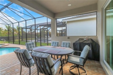 Enjoy the sunrise views from this generously appointed 2,202 sq on Bonita National Golf Course in Florida - for sale on GolfHomes.com, golf home, golf lot