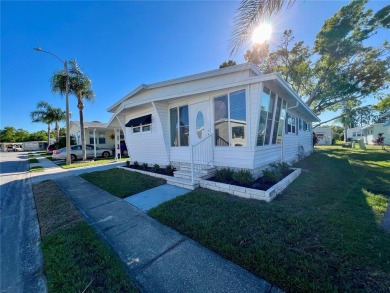 This beautifully updated two-bedroom, two-bath home offers the on Fairway Village Golf Course in Florida - for sale on GolfHomes.com, golf home, golf lot