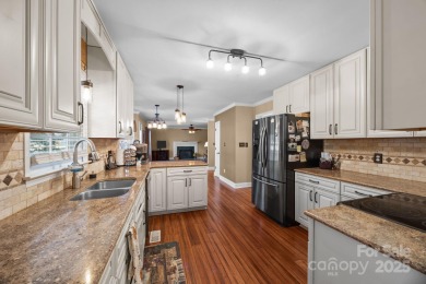 Welcome to 410 Wildwood Drive, nestled in the highly on Corbin Hills Golf Club in North Carolina - for sale on GolfHomes.com, golf home, golf lot