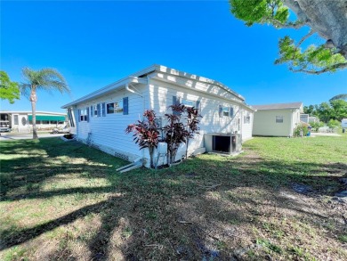 This beautifully updated two-bedroom, two-bath home offers the on Fairway Village Golf Course in Florida - for sale on GolfHomes.com, golf home, golf lot