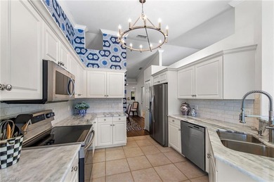 Designer finishes, curated decor, and extensive updates on Stoneybrook Golf Club in Florida - for sale on GolfHomes.com, golf home, golf lot