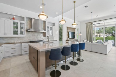 Welcome to 687 Hermitage Circle--an exceptional custom modern on Frenchmans Reserve in Florida - for sale on GolfHomes.com, golf home, golf lot