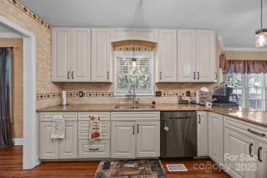 Welcome to 410 Wildwood Drive, nestled in the highly on Corbin Hills Golf Club in North Carolina - for sale on GolfHomes.com, golf home, golf lot