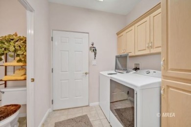 This home has amazing views of the valley and golf course! This on The Oasis Golf Club in Nevada - for sale on GolfHomes.com, golf home, golf lot