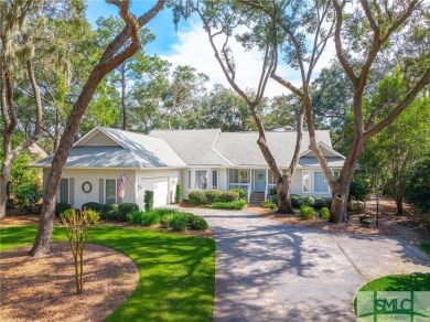 Situated on a beautiful lot overlooking a lagoon and the 17th on The Landings Club - Palmetto in Georgia - for sale on GolfHomes.com, golf home, golf lot