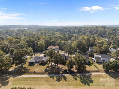 Welcome to 410 Wildwood Drive, nestled in the highly on Corbin Hills Golf Club in North Carolina - for sale on GolfHomes.com, golf home, golf lot