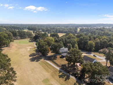 Welcome to 410 Wildwood Drive, nestled in the highly on Corbin Hills Golf Club in North Carolina - for sale on GolfHomes.com, golf home, golf lot
