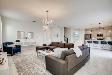 Welcome to this elegant 6-bedroom, 6-bath residence located in on National Golf Course in Florida - for sale on GolfHomes.com, golf home, golf lot