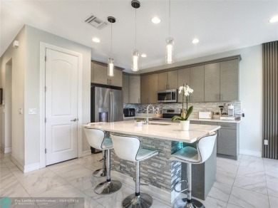 Stunning 2019 townhome located in the highly desirable Enclave on Boca Dunes Golf and Country Club in Florida - for sale on GolfHomes.com, golf home, golf lot