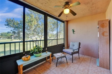 MUST SEE MOVE-IN READY, SPECTACULAR GOLF COURSE VIEWS, 2ND FLOOR on Oriole Golf and Tennis Club in Florida - for sale on GolfHomes.com, golf home, golf lot