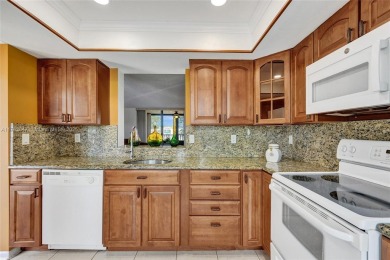 MUST SEE MOVE-IN READY, SPECTACULAR GOLF COURSE VIEWS, 2ND FLOOR on Oriole Golf and Tennis Club in Florida - for sale on GolfHomes.com, golf home, golf lot