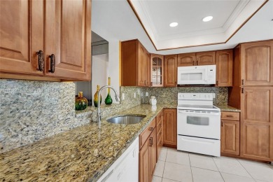 MUST SEE MOVE-IN READY, SPECTACULAR GOLF COURSE VIEWS, 2ND FLOOR on Oriole Golf and Tennis Club in Florida - for sale on GolfHomes.com, golf home, golf lot
