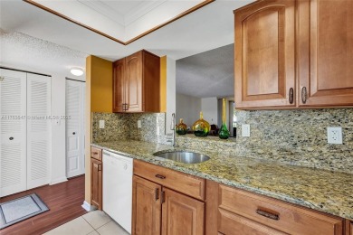 MUST SEE MOVE-IN READY, SPECTACULAR GOLF COURSE VIEWS, 2ND FLOOR on Oriole Golf and Tennis Club in Florida - for sale on GolfHomes.com, golf home, golf lot