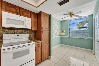 MUST SEE MOVE-IN READY, SPECTACULAR GOLF COURSE VIEWS, 2ND FLOOR on Oriole Golf and Tennis Club in Florida - for sale on GolfHomes.com, golf home, golf lot