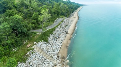 Discover the allure of lakeside living at Highfield Beach Club on South Haven Golf Club in Michigan - for sale on GolfHomes.com, golf home, golf lot