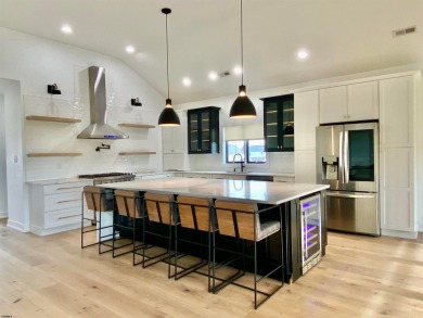 THIS IS LIVING! New on the Market! This stunning 4BD/4.5 BA home on The Links At Brigantine Beach in New Jersey - for sale on GolfHomes.com, golf home, golf lot