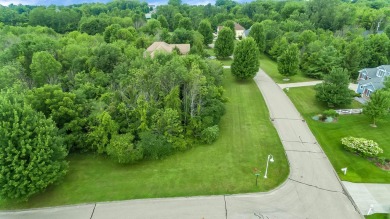 Discover the allure of lakeside living at Highfield Beach Club on South Haven Golf Club in Michigan - for sale on GolfHomes.com, golf home, golf lot