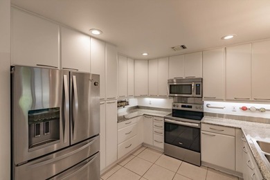 Fully renovated: modern kitchen with SS appliances and granite on Heritage Ridge Golf Club in Florida - for sale on GolfHomes.com, golf home, golf lot