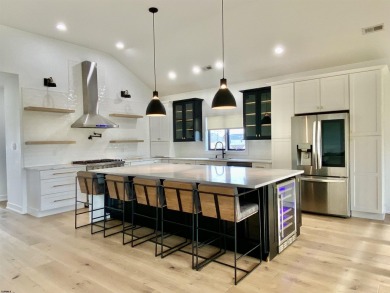 THIS IS LIVING! This stunning 4BD/4.5 BA home will *Wow* you at on The Links At Brigantine Beach in New Jersey - for sale on GolfHomes.com, golf home, golf lot