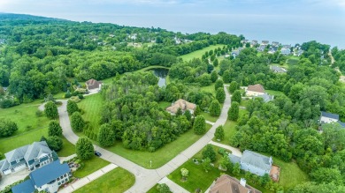 Discover the allure of lakeside living at Highfield Beach Club on South Haven Golf Club in Michigan - for sale on GolfHomes.com, golf home, golf lot