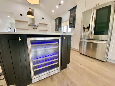 THIS IS LIVING! This stunning 4BD/4.5 BA home will *Wow* you at on The Links At Brigantine Beach in New Jersey - for sale on GolfHomes.com, golf home, golf lot