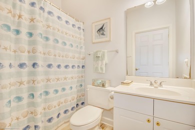 Welcome to your first-floor condo located in River Crossing at on Barefoot Resort and Golf Club  in South Carolina - for sale on GolfHomes.com, golf home, golf lot