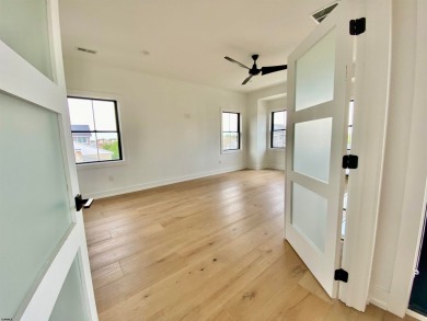 THIS IS LIVING! New on the Market! This stunning 4BD/4.5 BA home on The Links At Brigantine Beach in New Jersey - for sale on GolfHomes.com, golf home, golf lot
