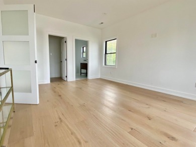 THIS IS LIVING! New on the Market! This stunning 4BD/4.5 BA home on The Links At Brigantine Beach in New Jersey - for sale on GolfHomes.com, golf home, golf lot