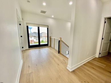 THIS IS LIVING! This stunning 4BD/4.5 BA home will *Wow* you at on The Links At Brigantine Beach in New Jersey - for sale on GolfHomes.com, golf home, golf lot