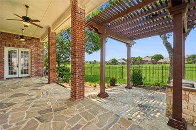 Welcome to a home that truly stands out--nestled in the on WestRidge Golf Course in Texas - for sale on GolfHomes.com, golf home, golf lot