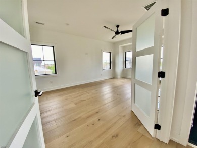 THIS IS LIVING! This stunning 4BD/4.5 BA home will *Wow* you at on The Links At Brigantine Beach in New Jersey - for sale on GolfHomes.com, golf home, golf lot