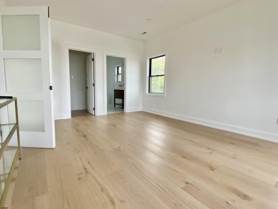 THIS IS LIVING! This stunning 4BD/4.5 BA home will *Wow* you at on The Links At Brigantine Beach in New Jersey - for sale on GolfHomes.com, golf home, golf lot