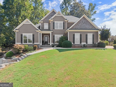 Welcome home to this stunning 5-bedroom, 3.5-bathroom gem on Traditions of Braselton Golf Club in Georgia - for sale on GolfHomes.com, golf home, golf lot