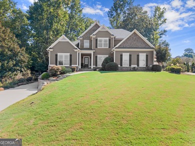 Welcome home to this stunning 5-bedroom, 3.5-bathroom gem on Traditions of Braselton Golf Club in Georgia - for sale on GolfHomes.com, golf home, golf lot