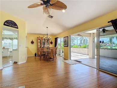 This well-maintained Villareal model home sits directly on the on Herons Glen Golf and Country Club in Florida - for sale on GolfHomes.com, golf home, golf lot