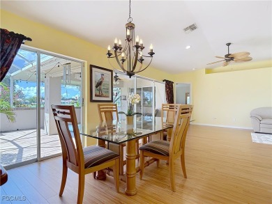 This well-maintained Villareal model home sits directly on the on Herons Glen Golf and Country Club in Florida - for sale on GolfHomes.com, golf home, golf lot