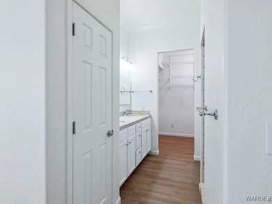 Experience the perfect blend of modern comfort and resort-style on Laughlin Ranch Golf Club in Arizona - for sale on GolfHomes.com, golf home, golf lot