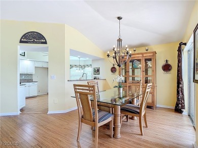 This well-maintained Villareal model home sits directly on the on Herons Glen Golf and Country Club in Florida - for sale on GolfHomes.com, golf home, golf lot