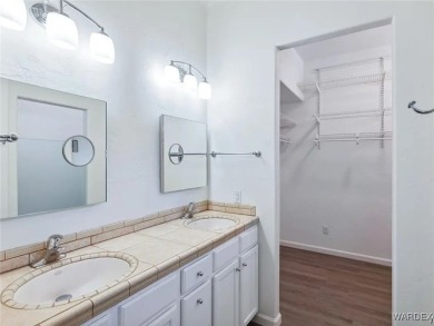 Experience the perfect blend of modern comfort and resort-style on Laughlin Ranch Golf Club in Arizona - for sale on GolfHomes.com, golf home, golf lot