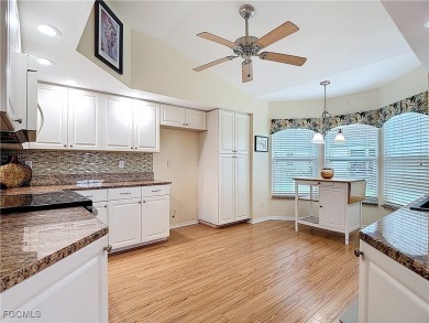 This well-maintained Villareal model home sits directly on the on Herons Glen Golf and Country Club in Florida - for sale on GolfHomes.com, golf home, golf lot